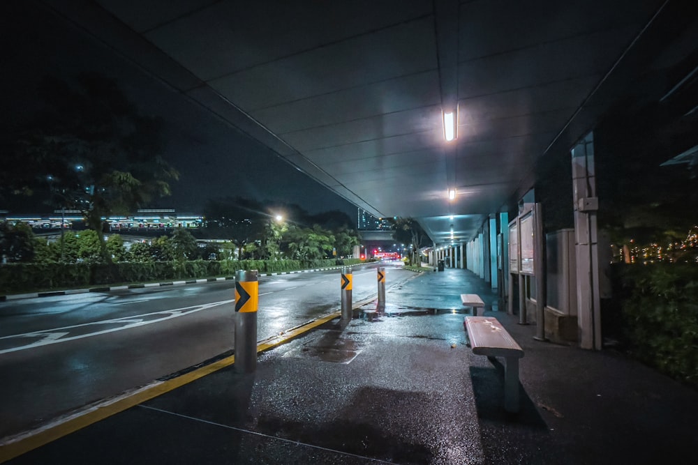 gray concrete road during night time