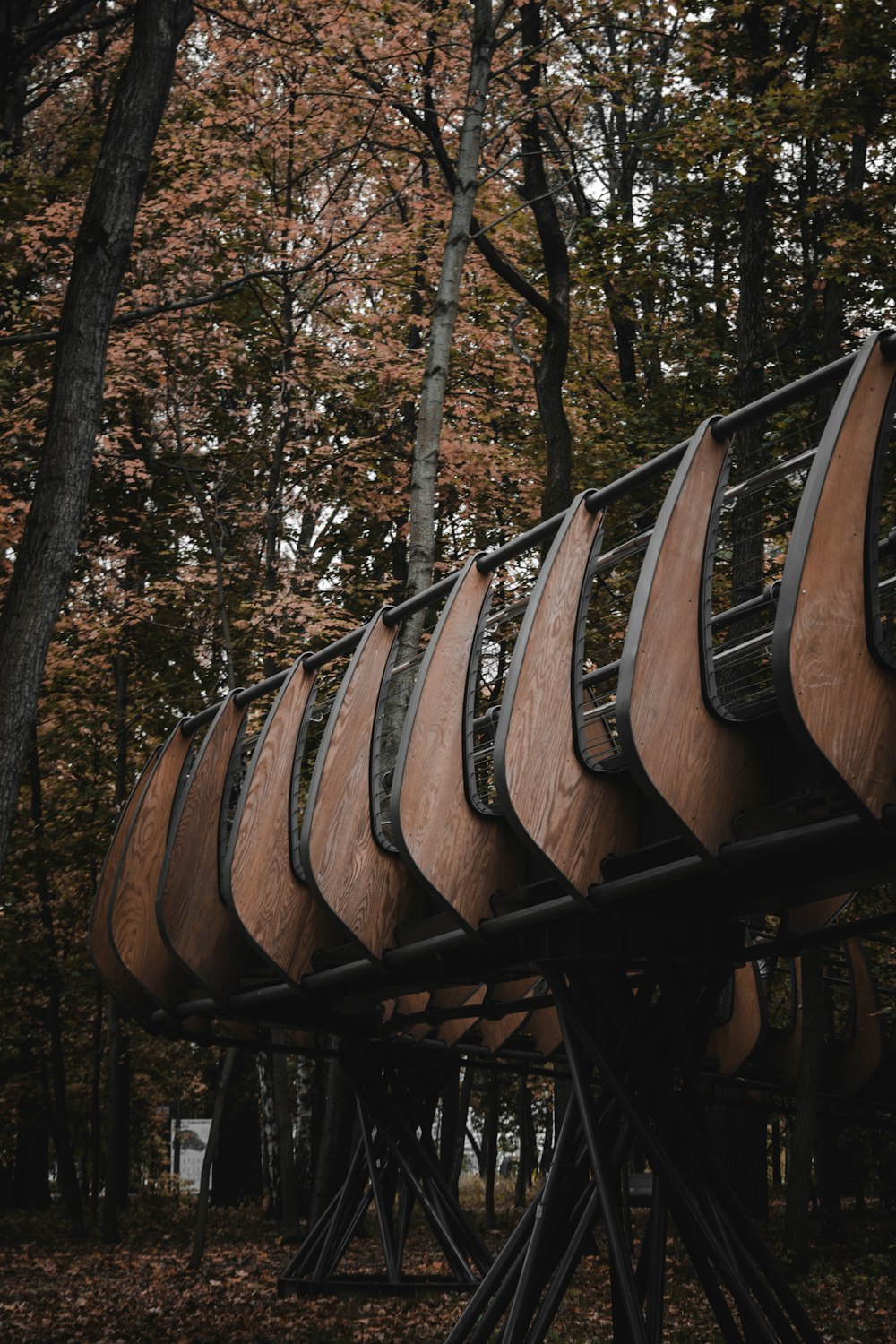 brown wooden bridge over river