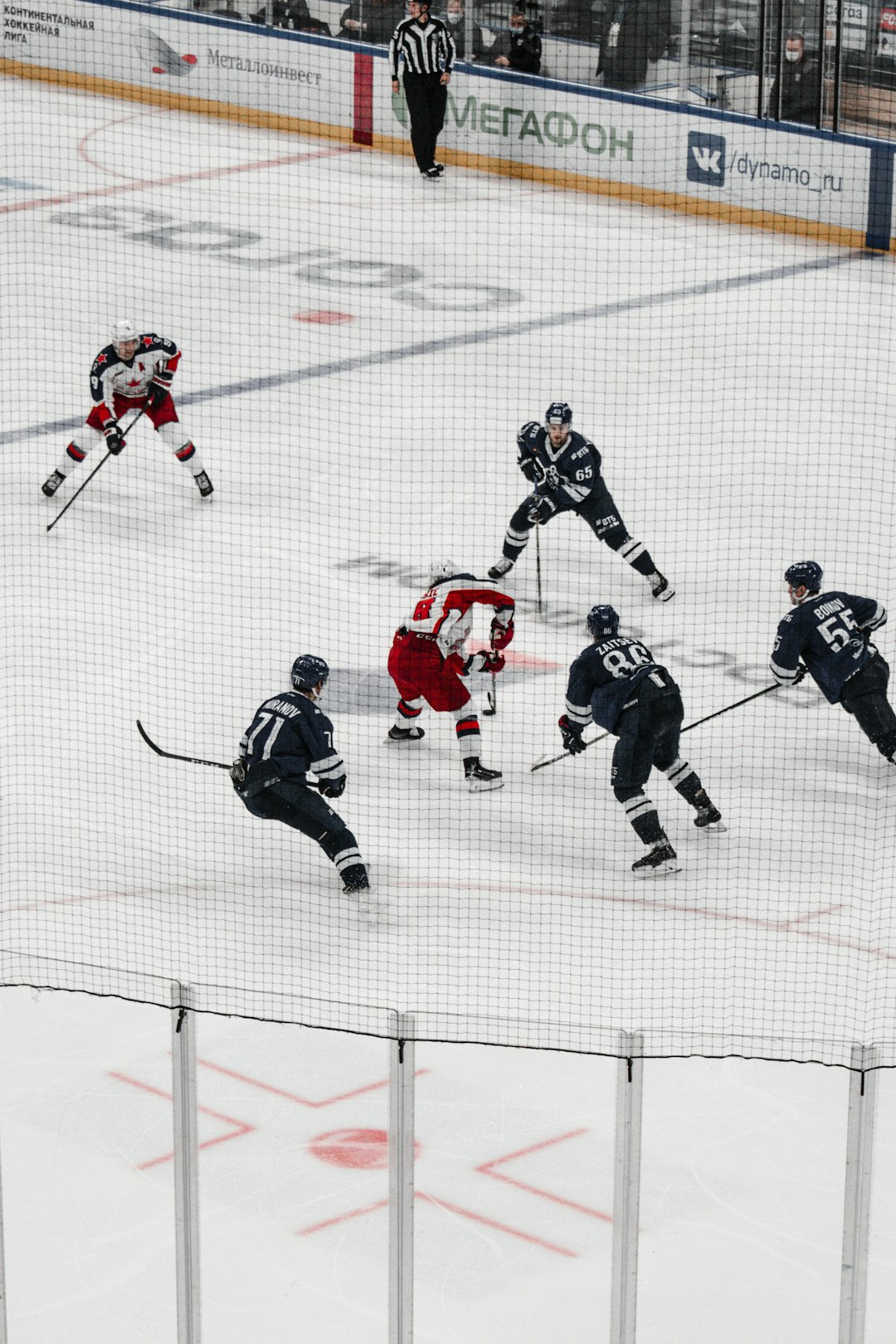 ice hockey players on ice hockey field