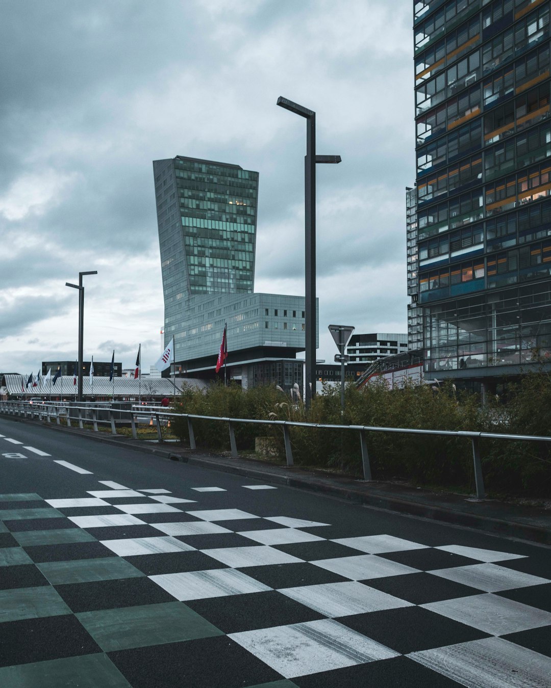 gray and white concrete building under gray sky