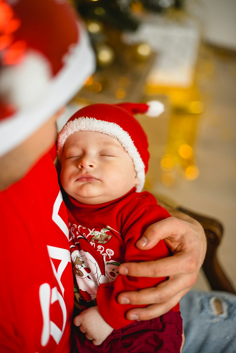 baby in red and white santa hat