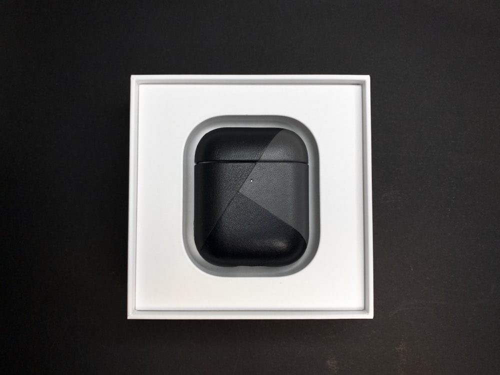 black square frame on black surface