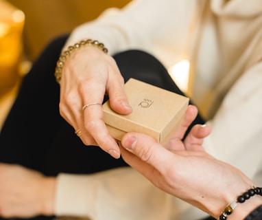 woman in white dress holding gold iphone 6