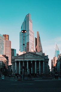 city buildings under blue sky during daytime