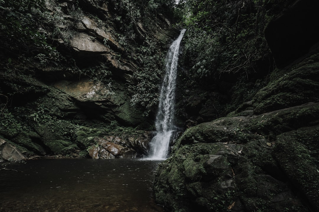 waterfalls in the middle of rocky mountain,