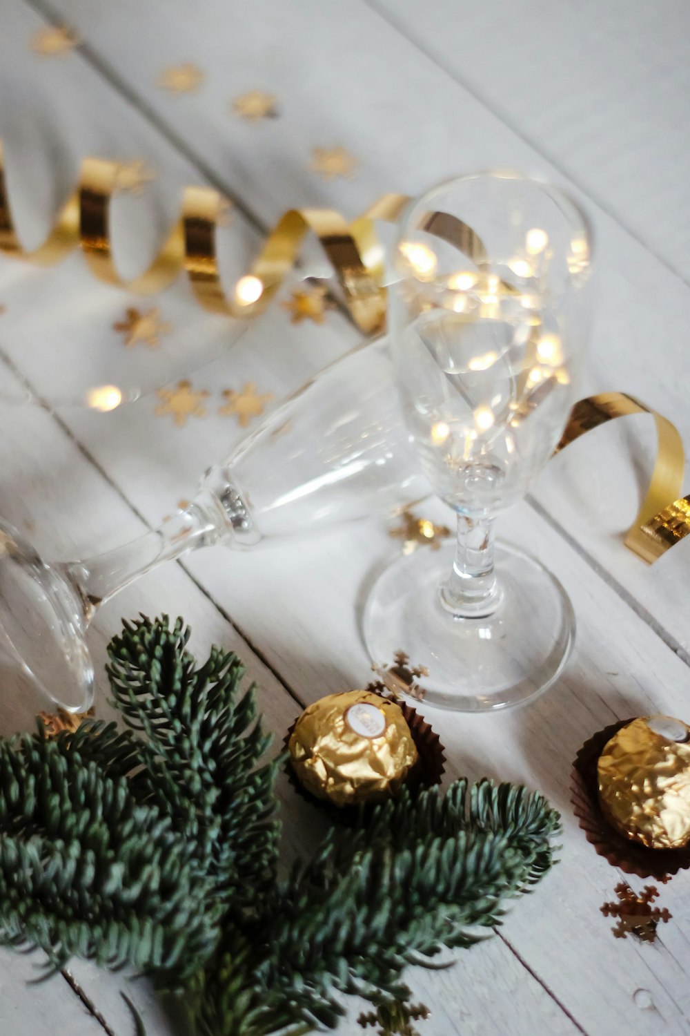 gold and silver baubles on clear glass rack