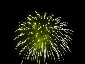 Eco-friendly green crackers emitting soft, colorful sparks with minimal smoke