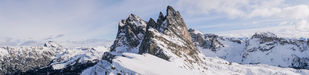 snow covered mountain during daytime