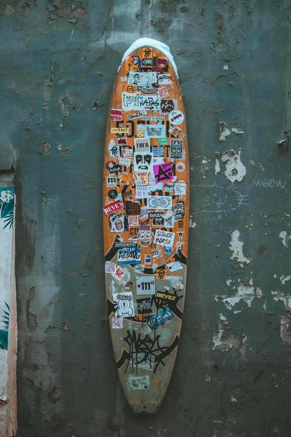 brown and white skateboard deck