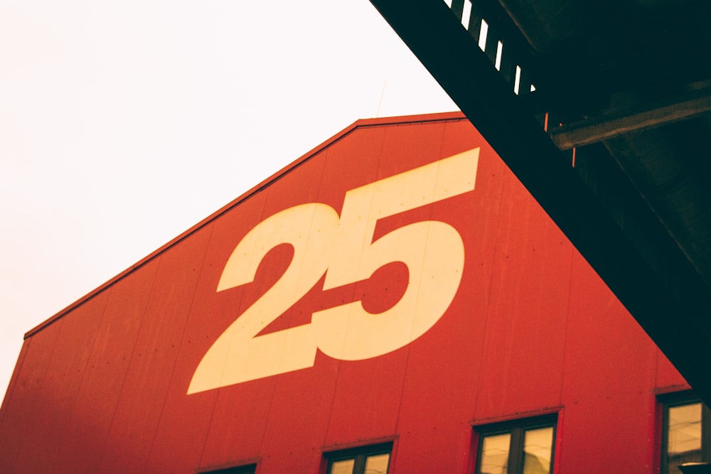a red building with the number twenty five on it
