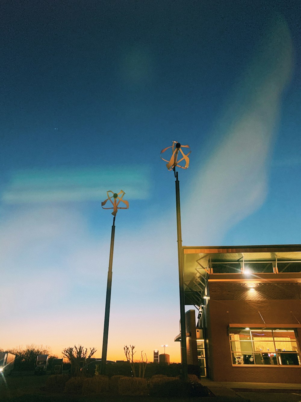 white street light turned on during night time