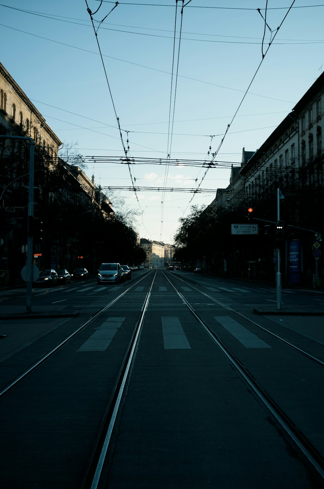 cars parked on side of the road during daytime