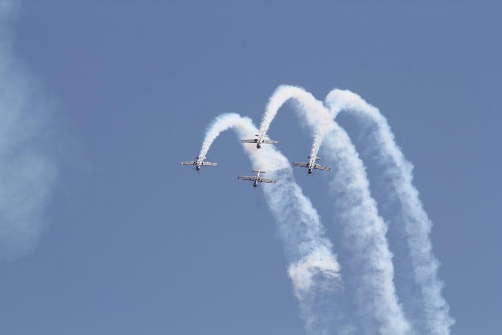 white jet plane in mid air