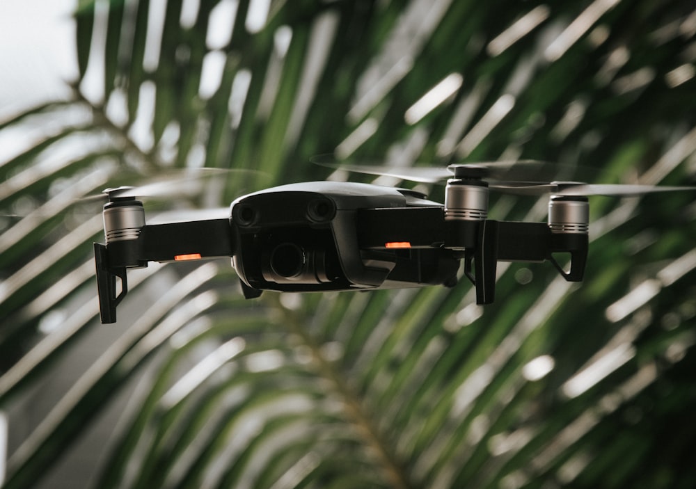 black and silver drone in tilt shift lens