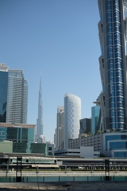 city buildings under blue sky during daytime