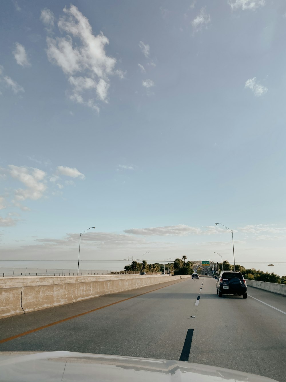 black car on road during daytime