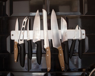 black and brown handled kitchen knives