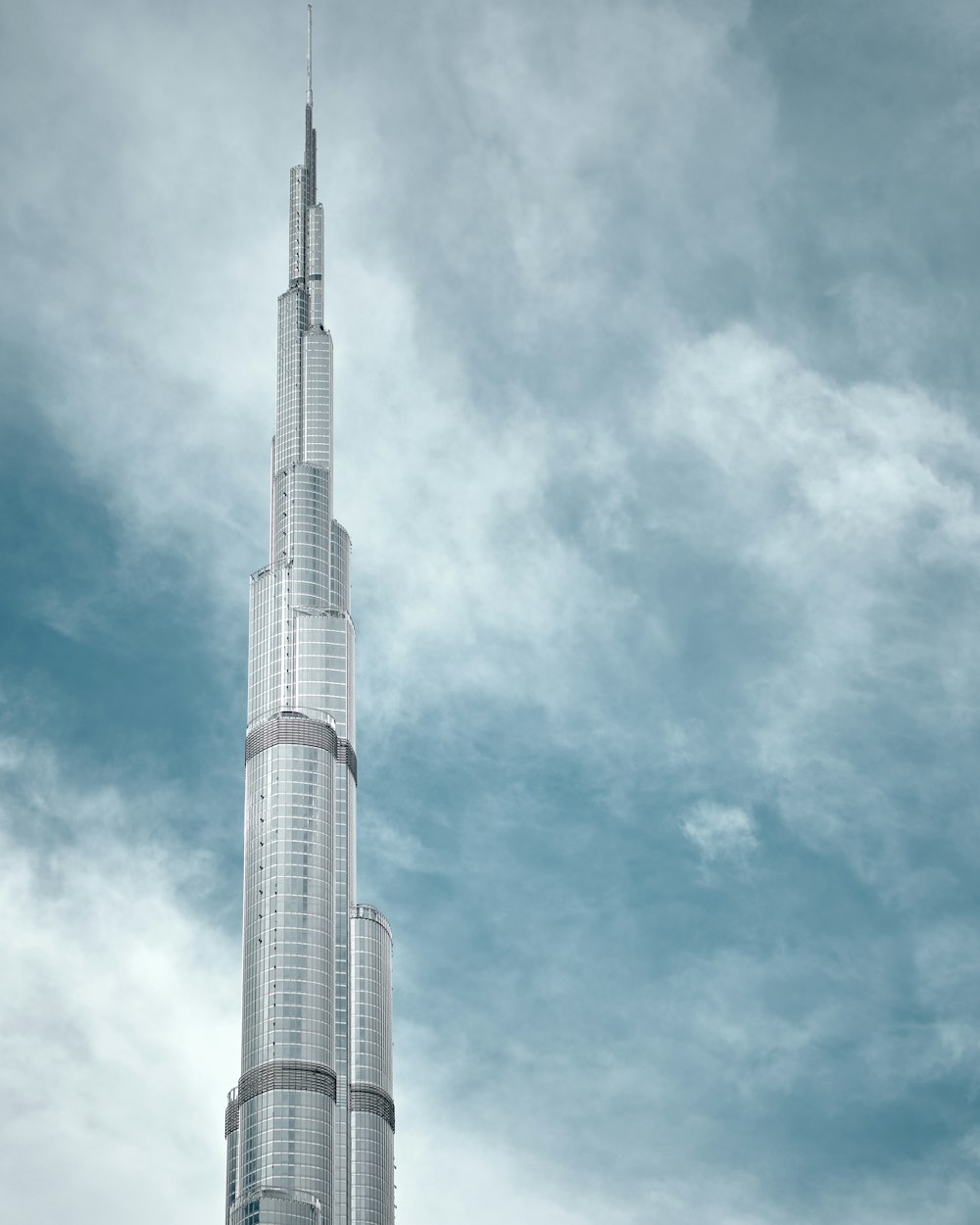 white and gray concrete tower under blue sky during daytime