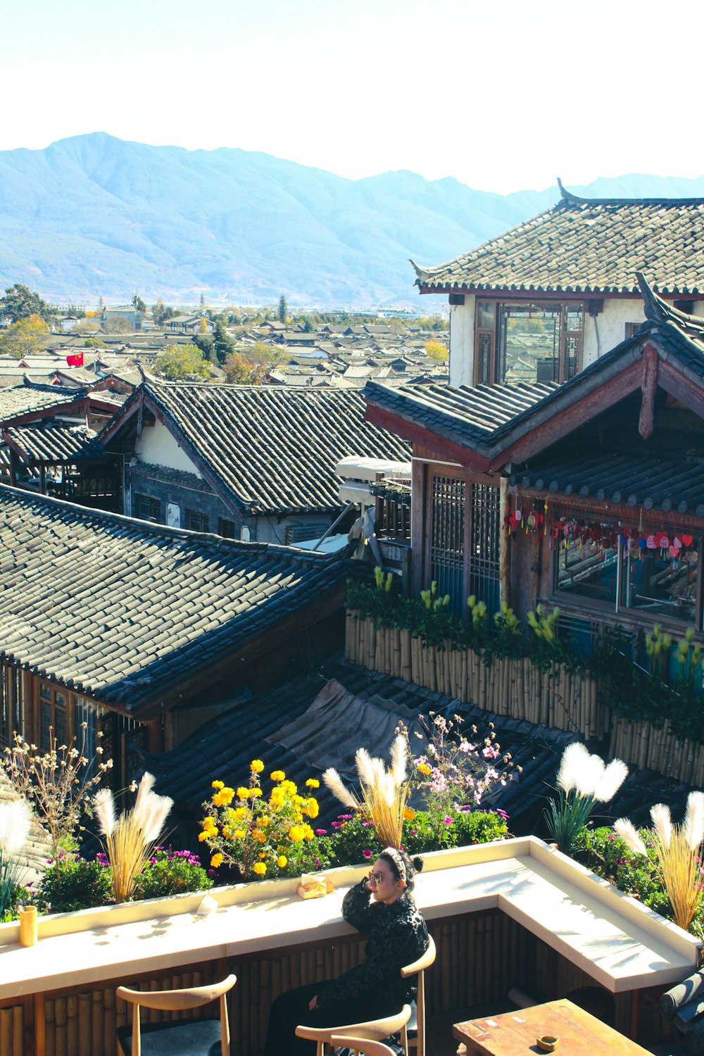 brown wooden house on top of mountain during daytime