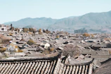 Panoramic view of the Atlas Mountains with lush valleys and traditional Berber villages.