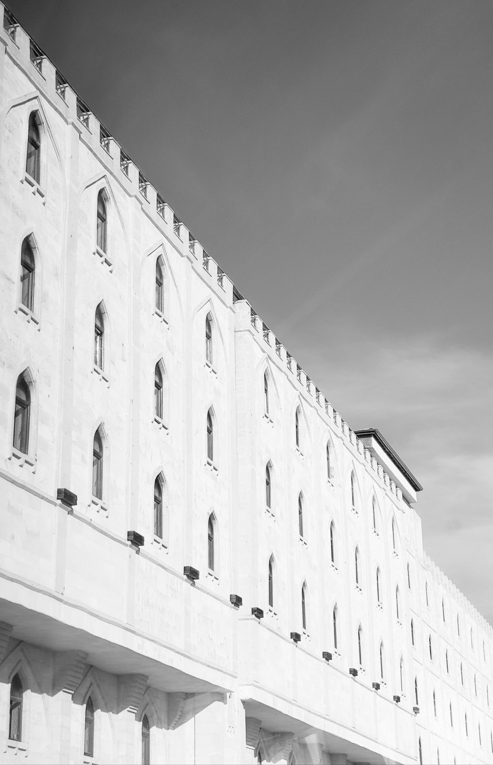 grayscale photo of concrete building