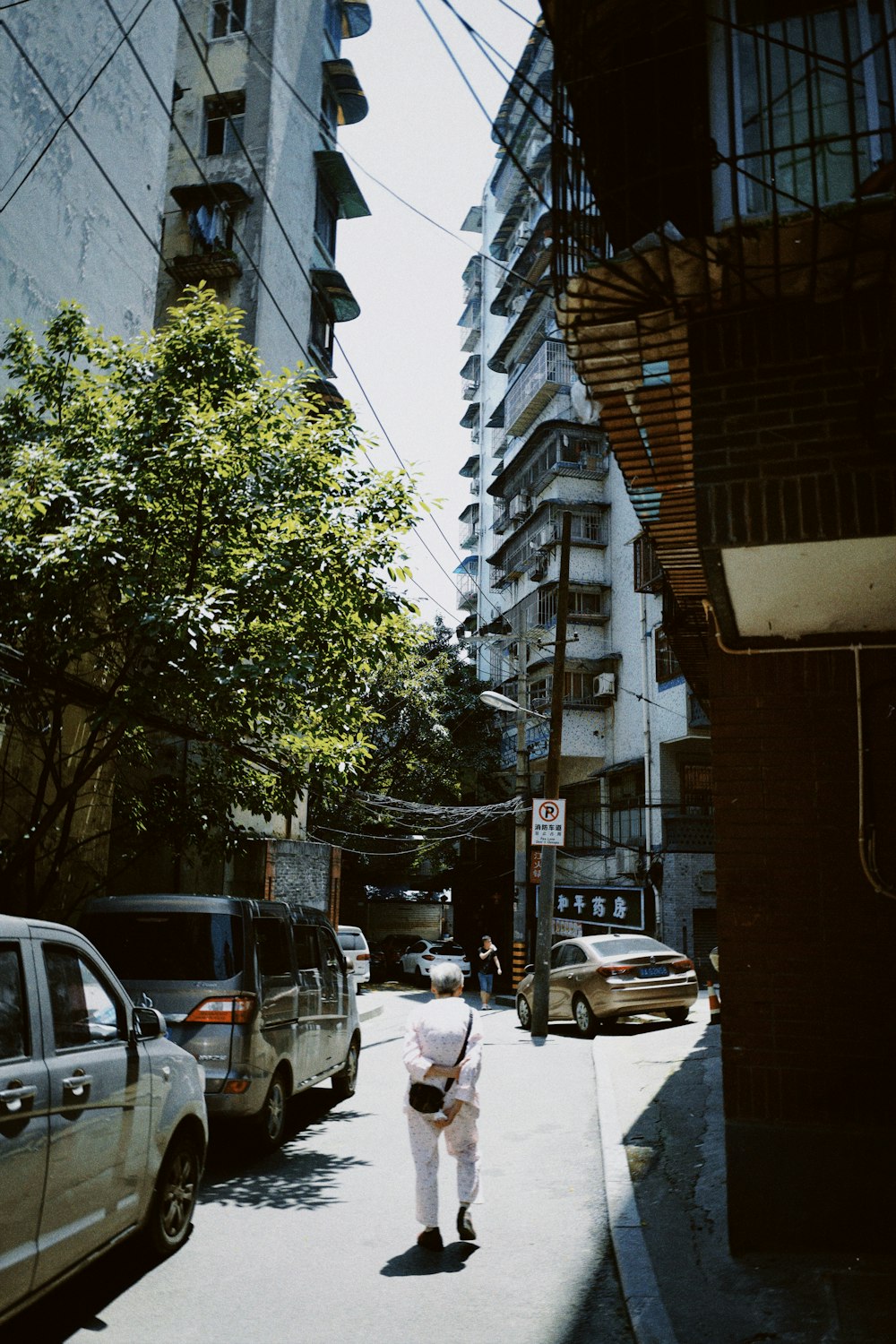 cars parked on side of the road during daytime