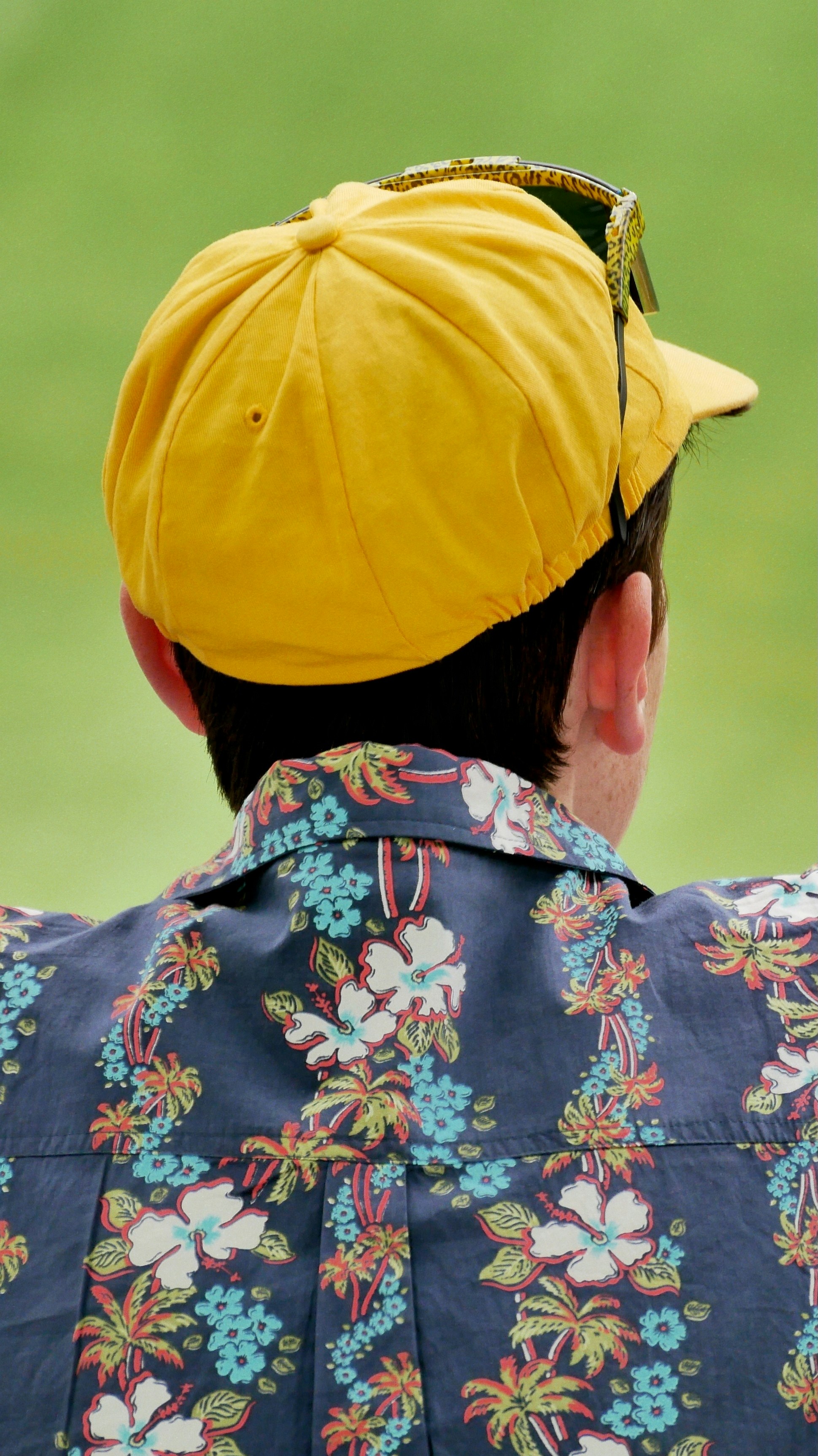 Person styling a retro football shirt with modern fashion accessories