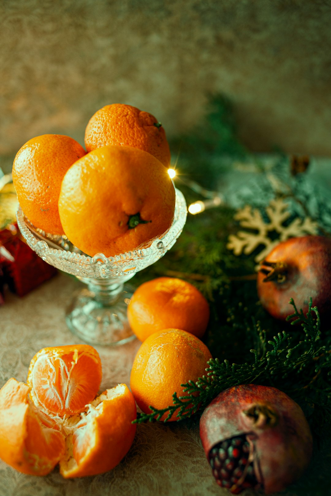 orange fruit on clear cut glass bowl
