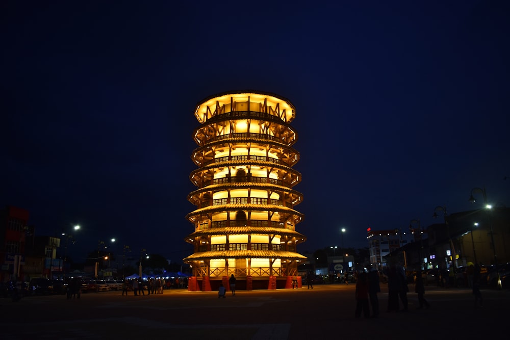 gold building with lights during night time