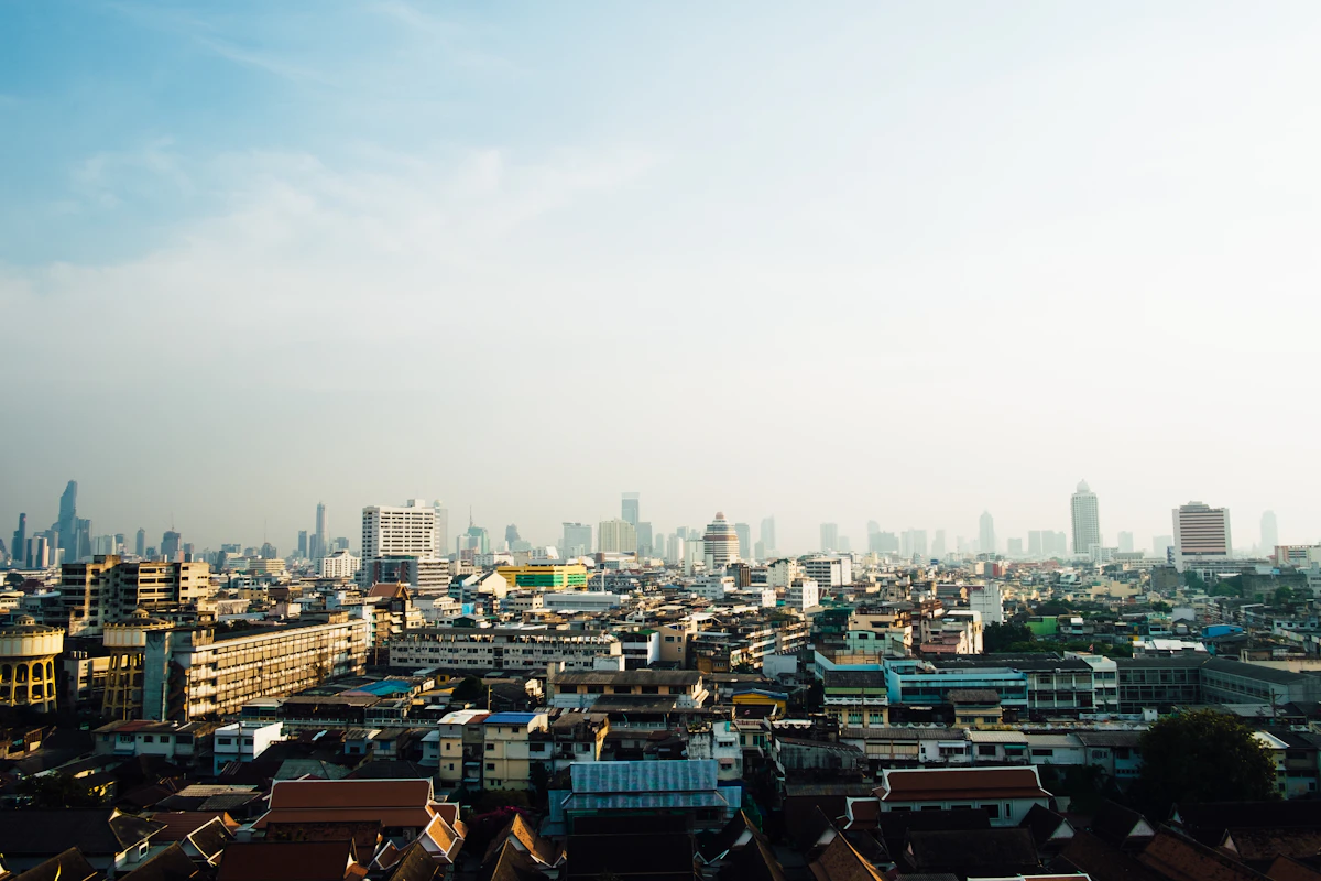 Aerial view of a Southeast Asian city skyline during daytime