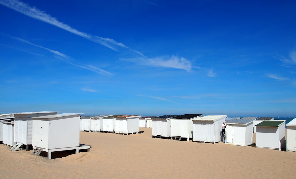 white and brown houses under blue sky during daytime