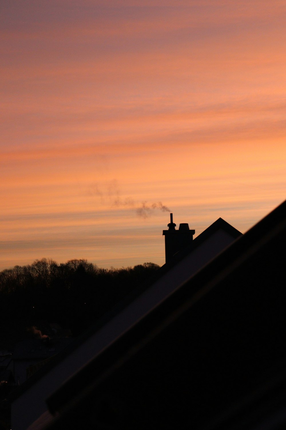 silhouette of building during sunset