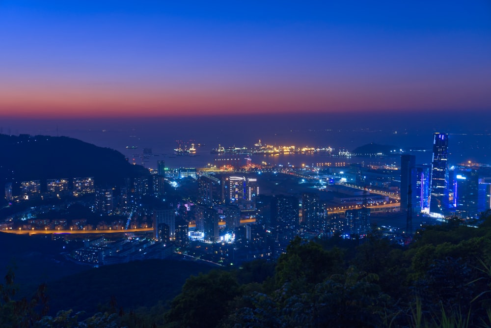 city skyline during night time