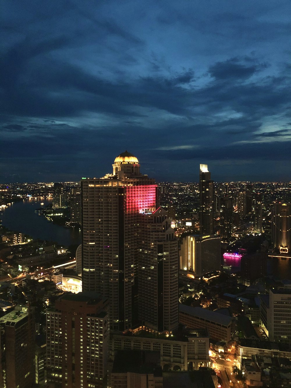 city skyline during night time