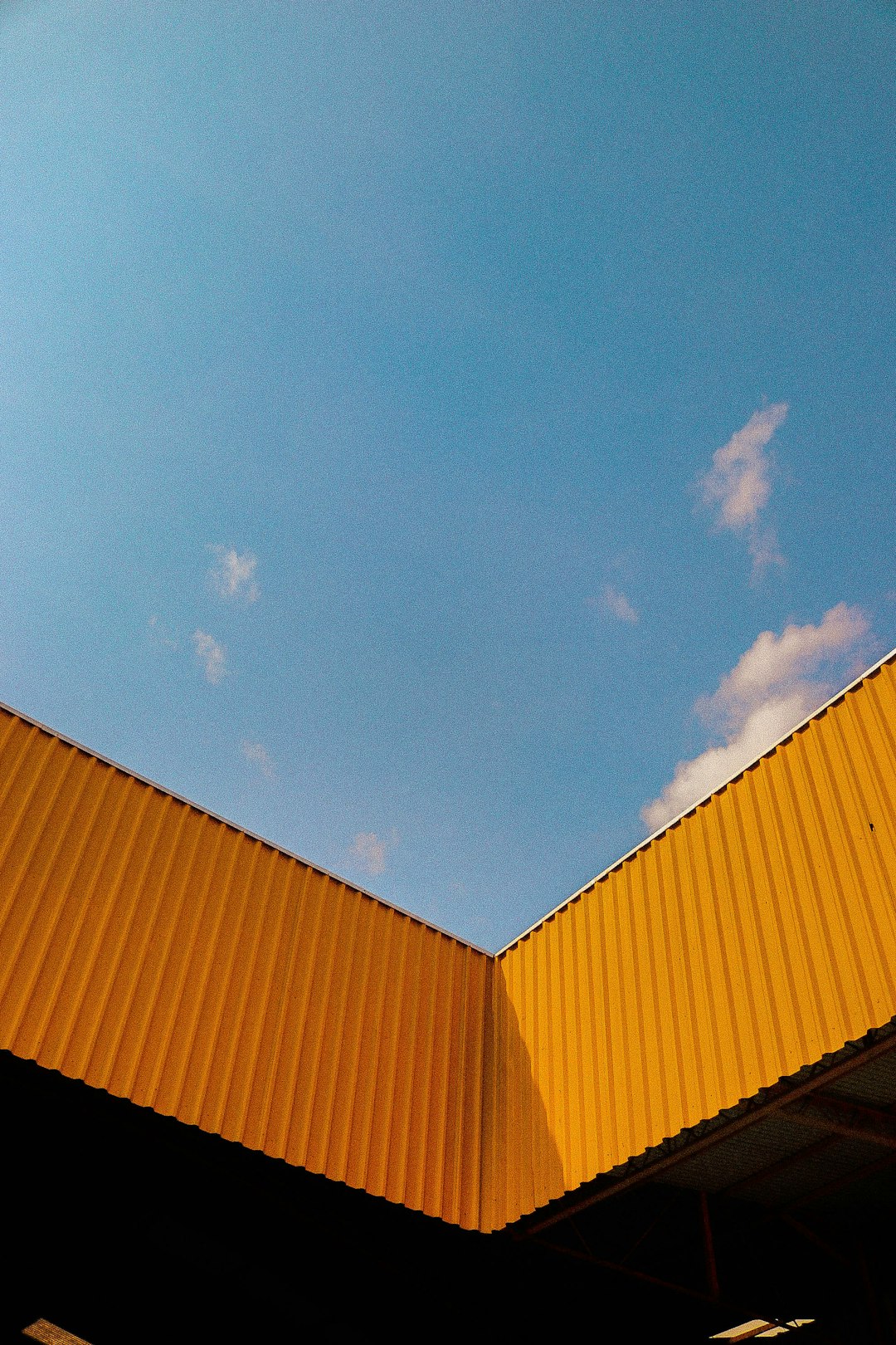 orange and yellow building under blue sky