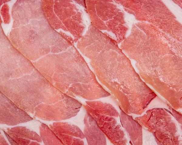 Raw meat on white surface