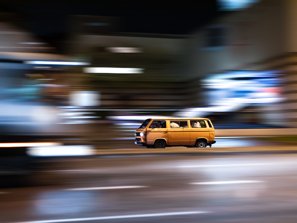 yellow taxi cab on road
