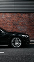 Chauffeured black luxury car for private transfers in Marbella