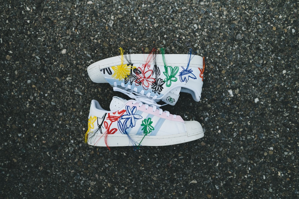 white red and yellow floral high top sneakers