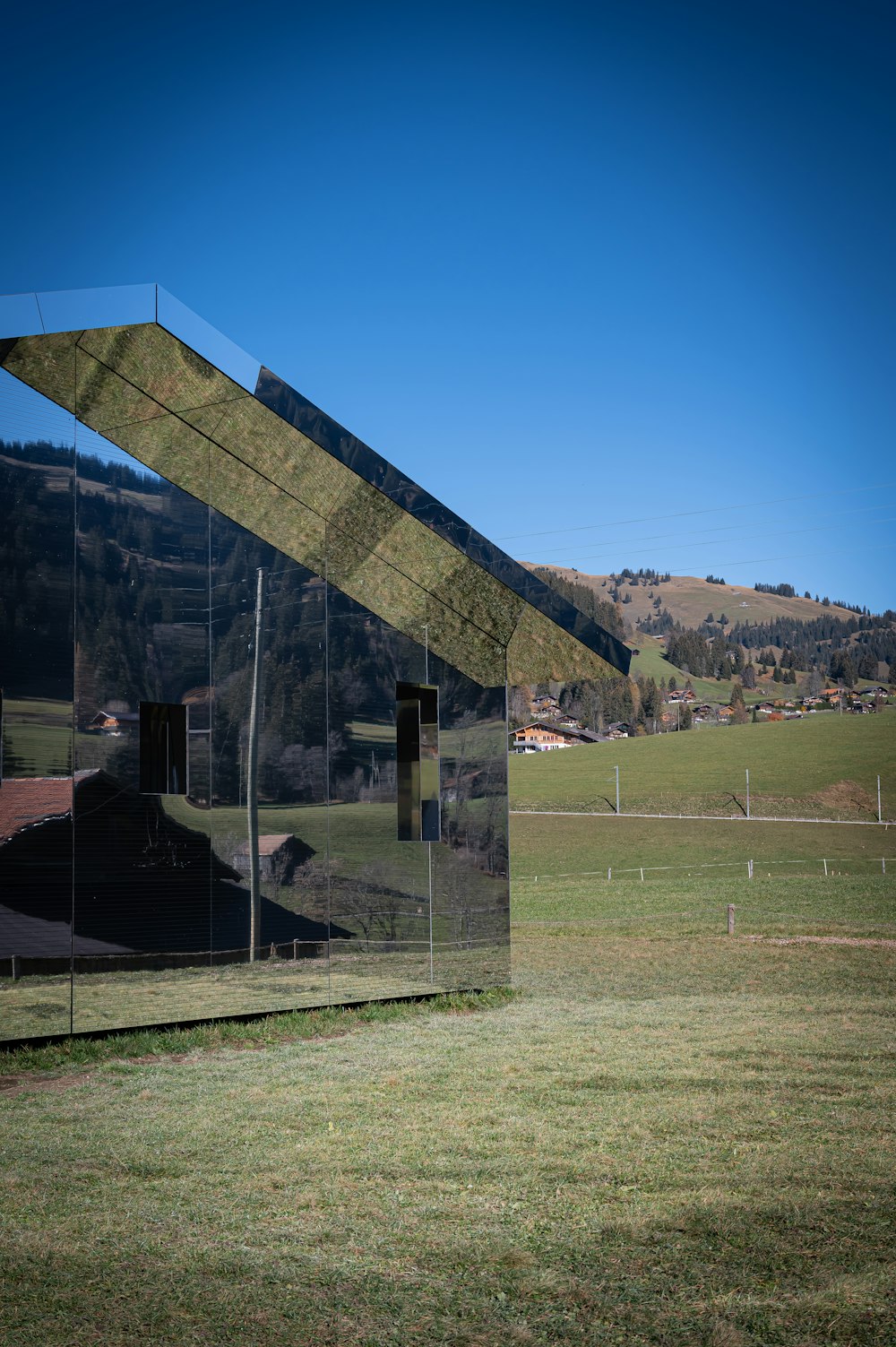 black and gray building on green grass field