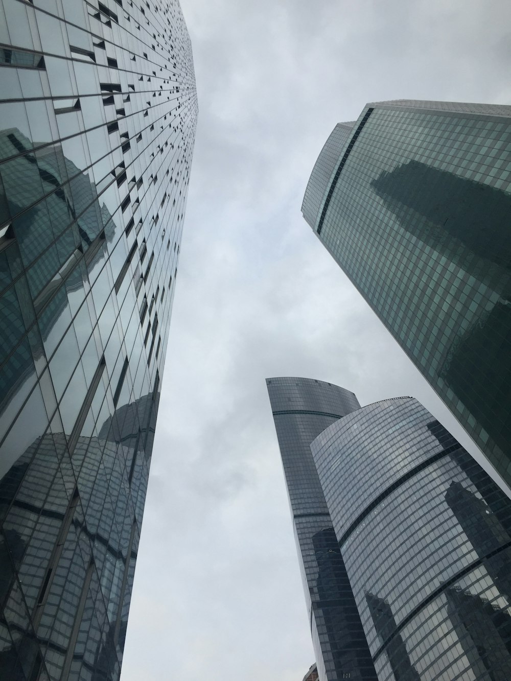 low angle photography of high rise buildings