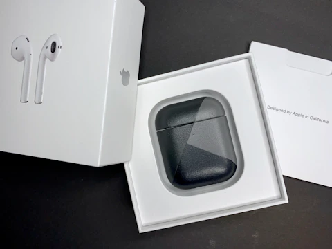 A customer unboxing the latest wireless headphones with excitement.