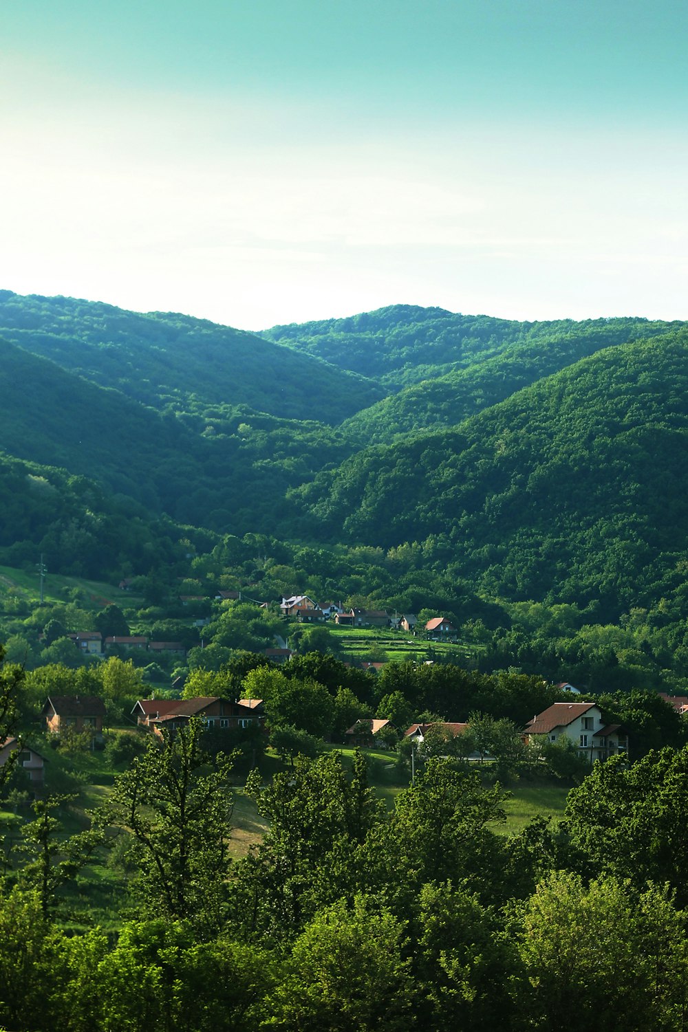 green mountains under white sky during daytime