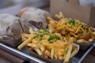 potato fries on black ceramic plate