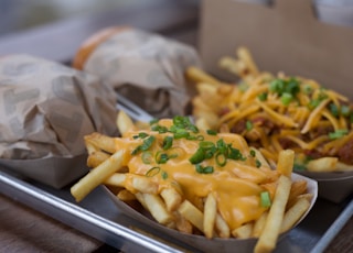 potato fries on black ceramic plate