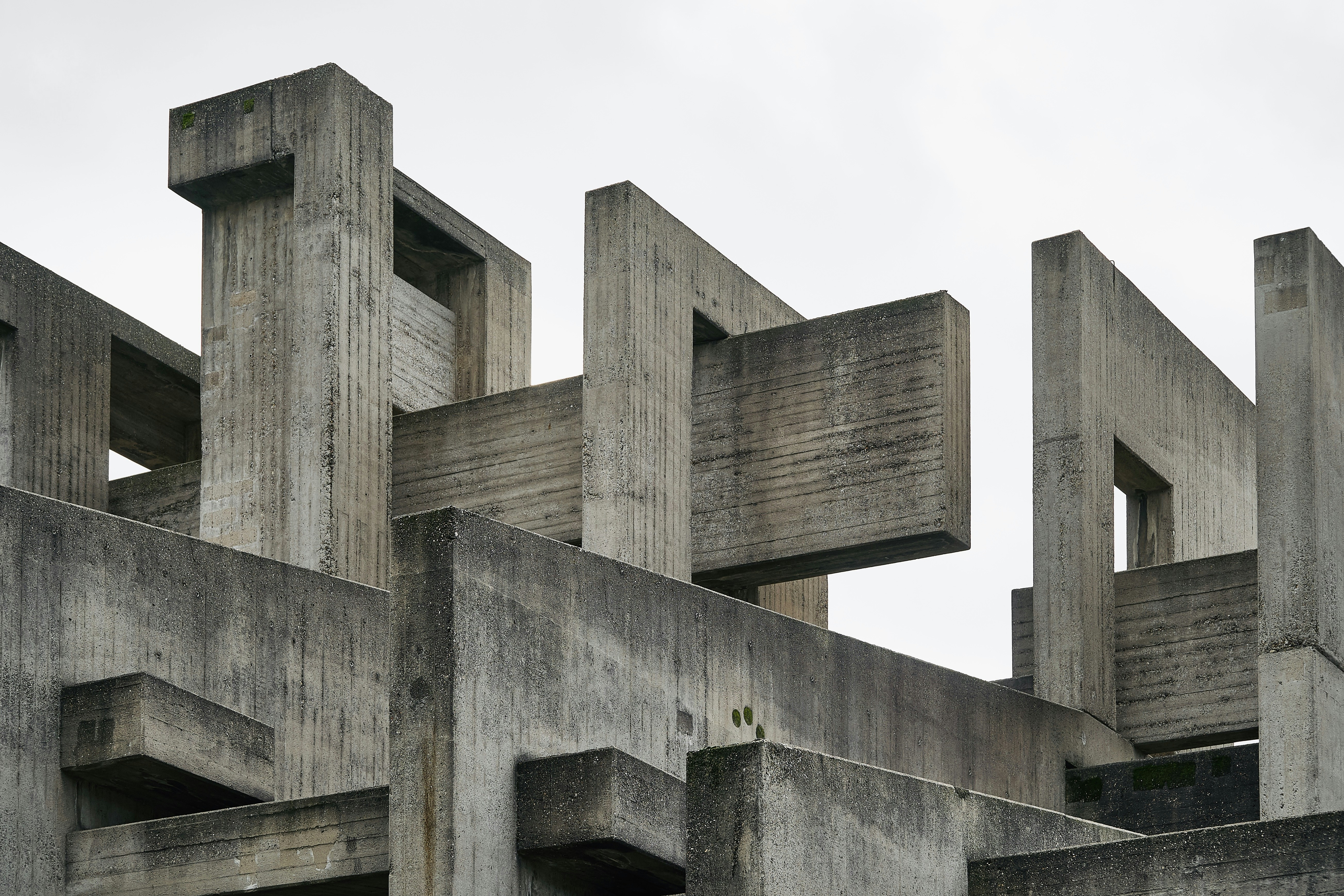 gray concrete building under white sky during daytime