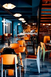 brown wooden chairs and tables