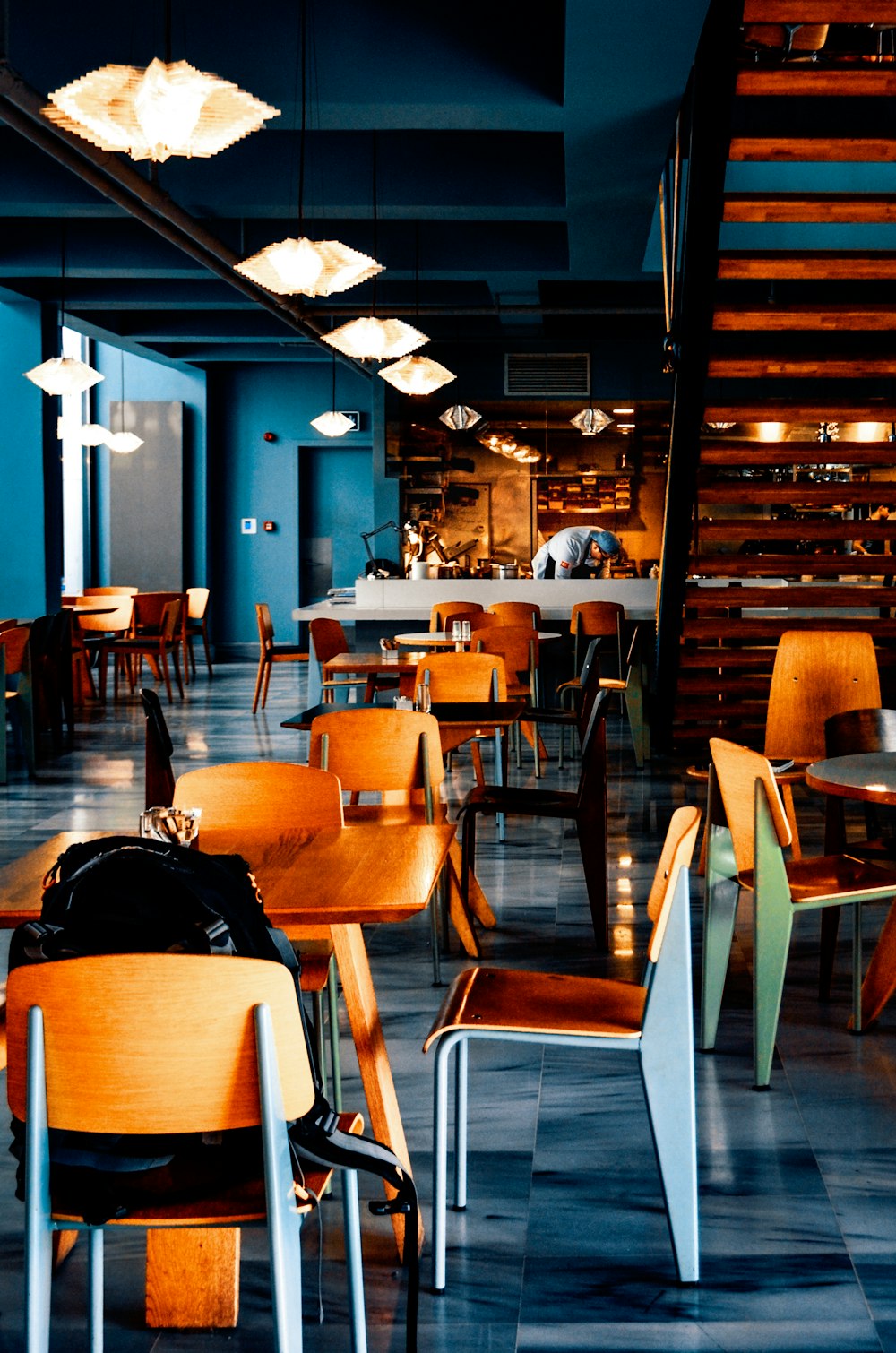 brown wooden chairs and tables