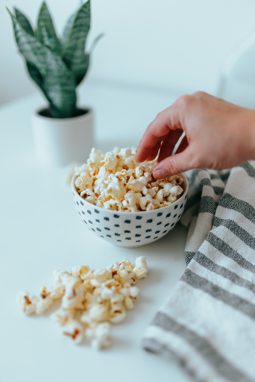 popcorn in white ceramic bowl