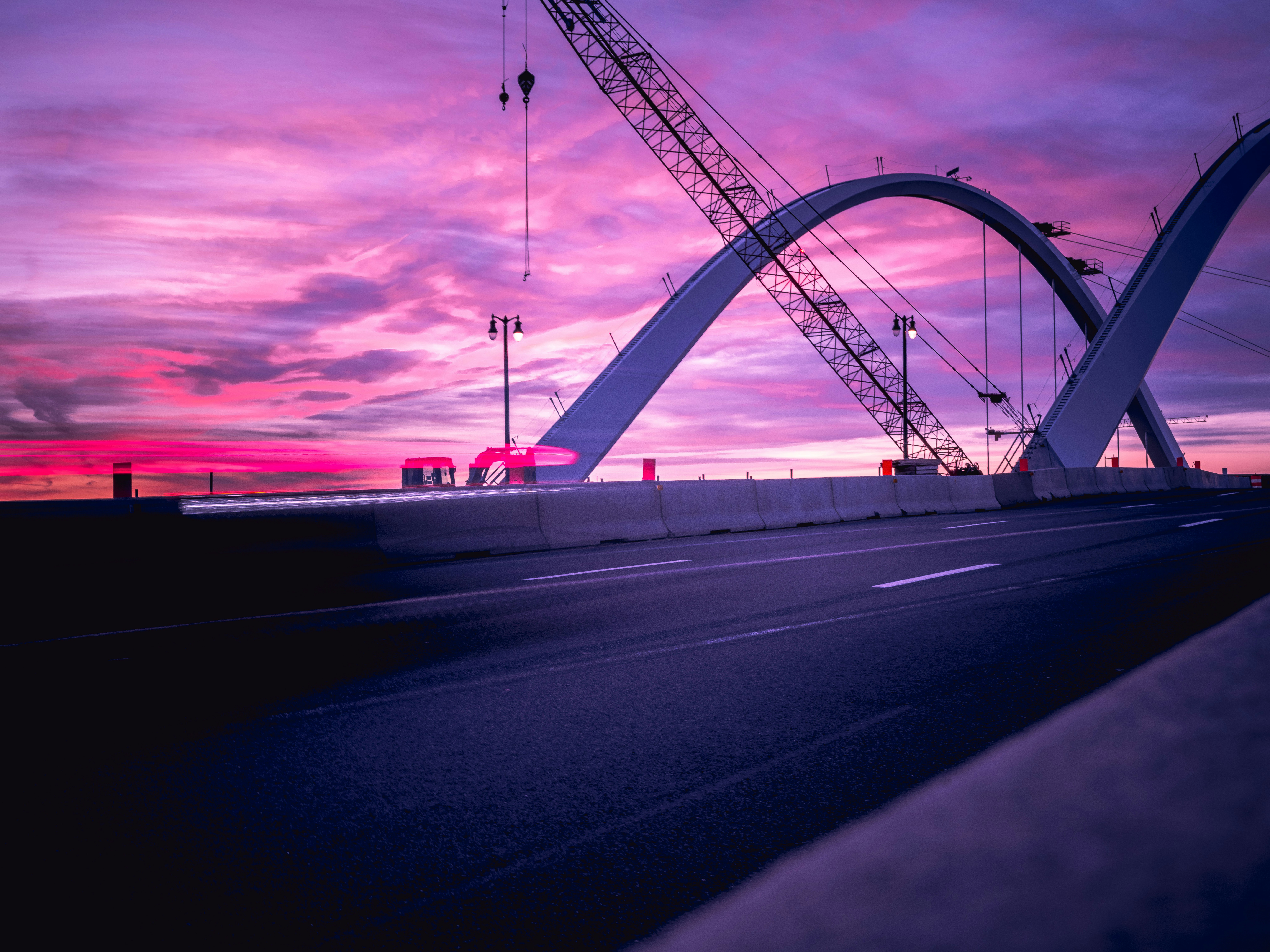 gray concrete bridge under gray sky
